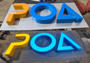 Illuminated 3D fabricated letters made of aluminium and acrylic